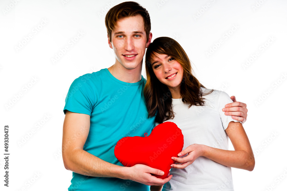 man gives a young and beautiful woman heart