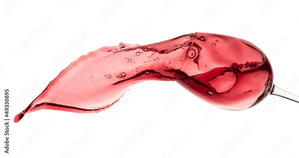 red wine splashing out of a glass, isolated on white red wine splashing out of a glass, isolated on white