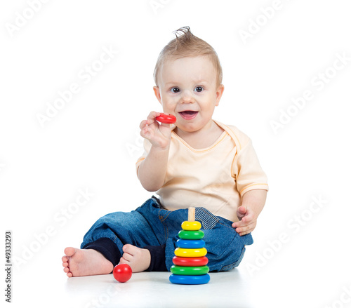 happy baby boy playing with...
