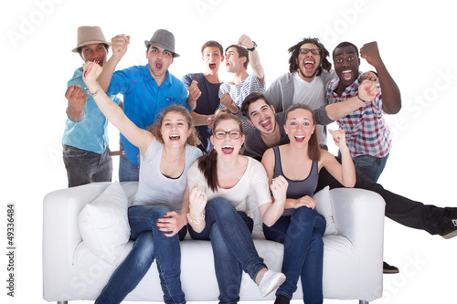 Group Of Friends Enjoying Watching Television