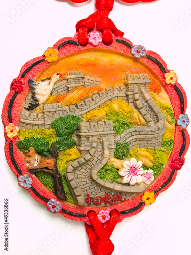 Great wall of China bas relief pendant isolated on white backgro