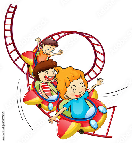 Three children riding in a roller coaster