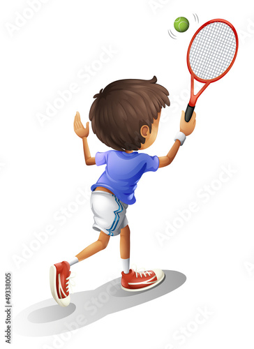 A kid playing tennis