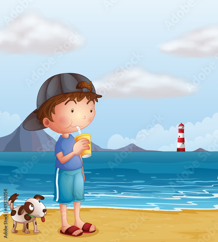 A boy and his pet at the beach