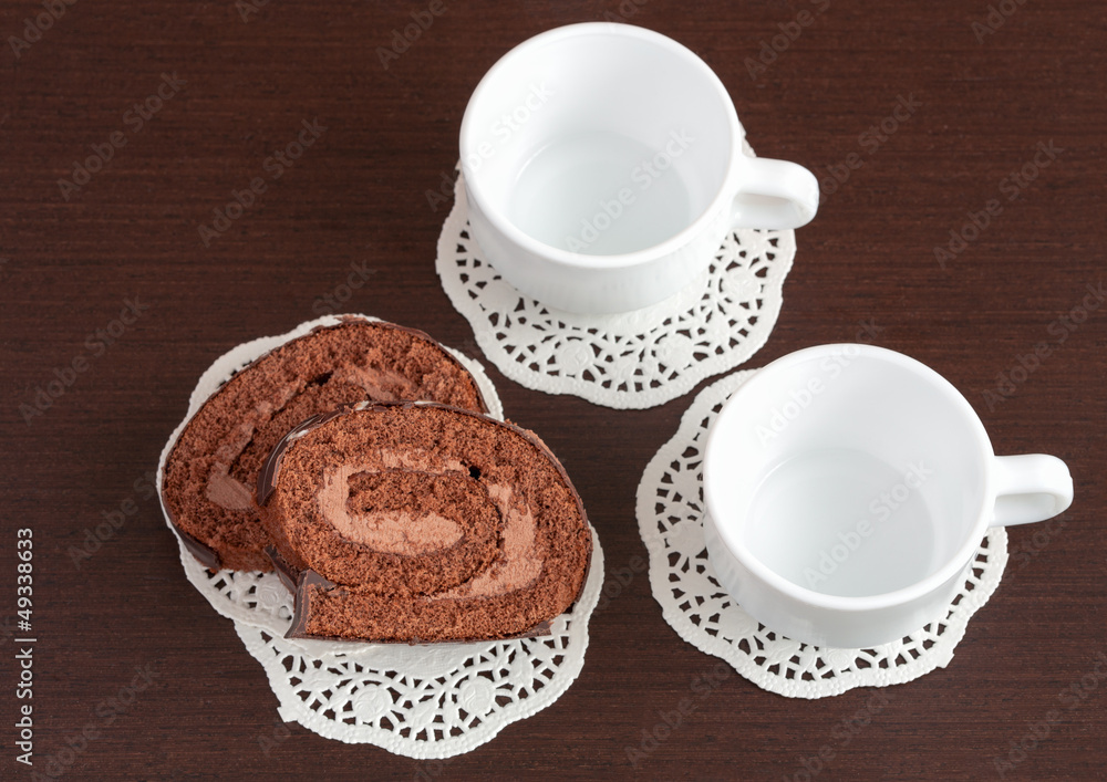 chocolate roll on napkins and cup