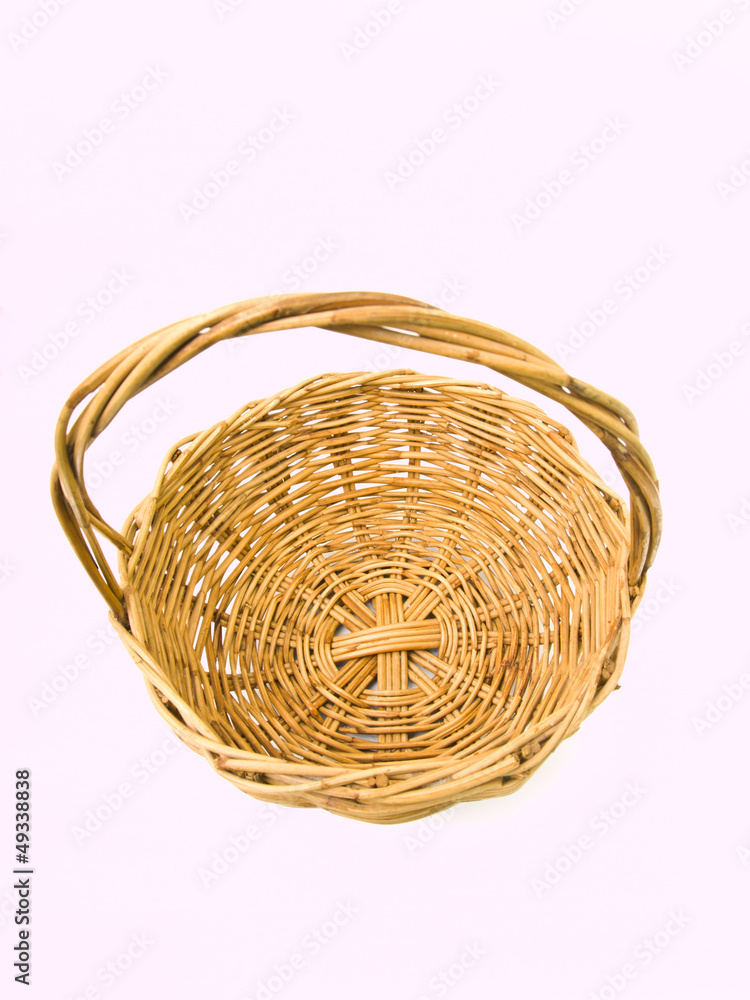 Empty wicker basket isolated on white Empty wicker basket isolated on white