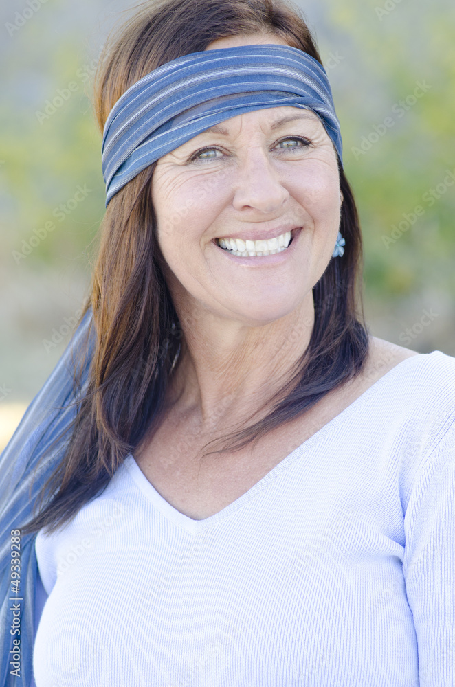 Portrait attractive happy mature woman outdoor Portrait attractive happy mature woman outdoor