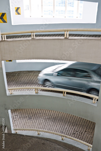 Car driving out of car park building