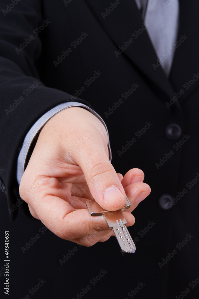 Fototapeta premium Business Woman Extends Home Key