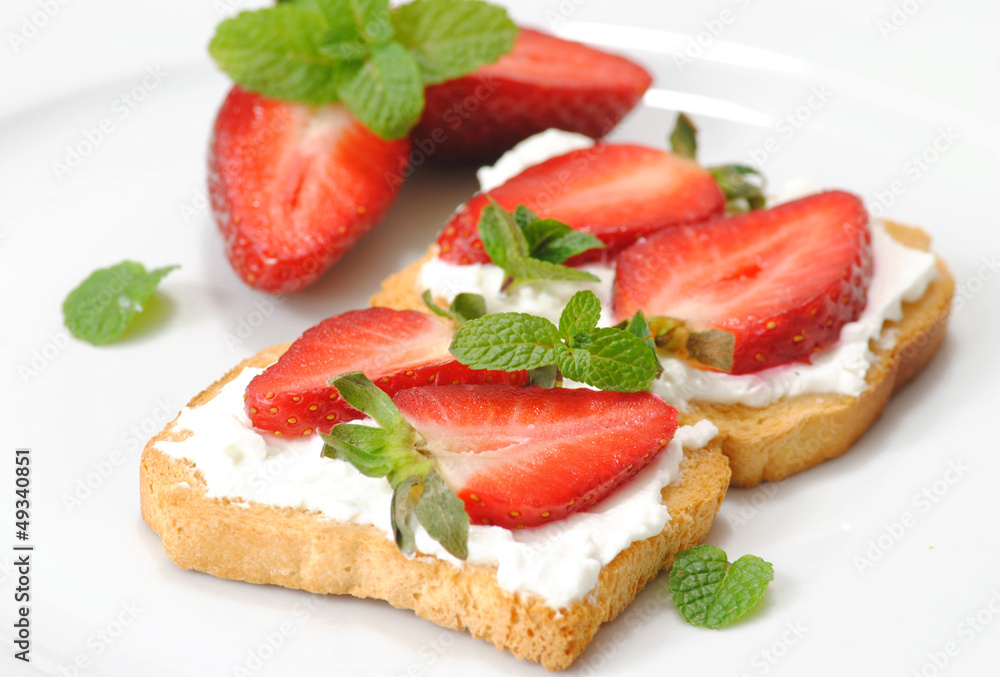 Breakfast toast with fresh strawberry fruit and cream