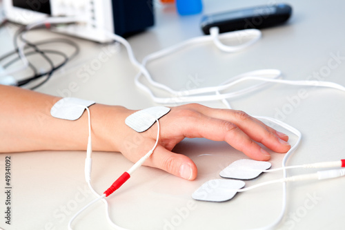 electrodes electric massage in physiotherapy room. tens therapy,