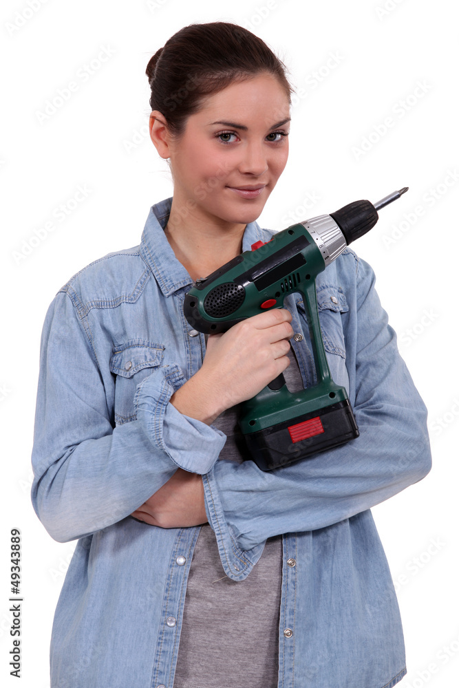 Woman with cordless drill Woman with cordless drill
