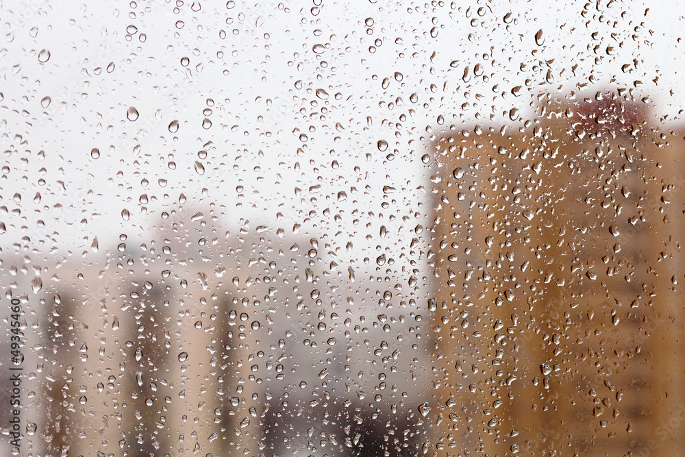 raindrops on glass window raindrops on glass window