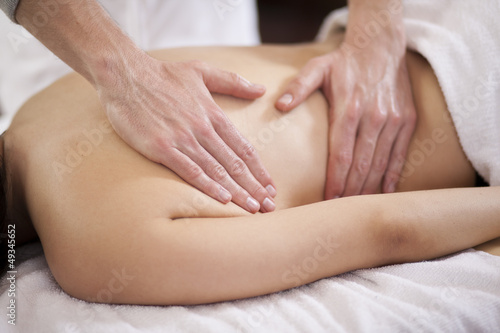Closeup of a woman getting a massage at a health and beauty spa