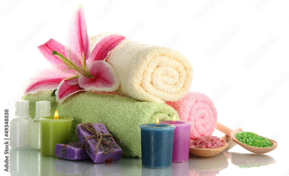 towels with lily, aroma oil, candles, soap and sea salt towels with lily, aroma oil, candles, soap and sea salt