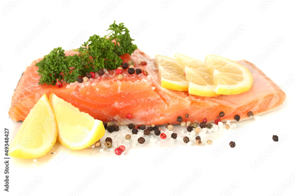 Fresh salmon fillet with herbals and lemon slices, isolated Fresh salmon fillet with herbals and lemon slices, isolated