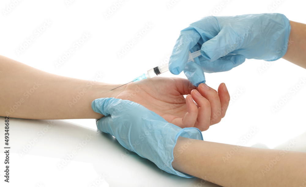 Doctor holding syringe with a vaccine in the patient hand, Doctor holding syringe with a vaccine in the patient hand,