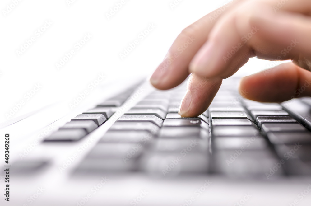 Business woman typing on keyboard Business woman typing on keyboard