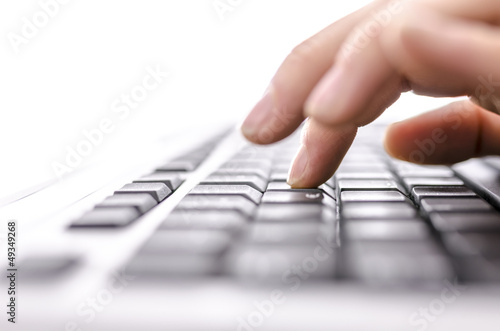Business woman typing on keyboard photo