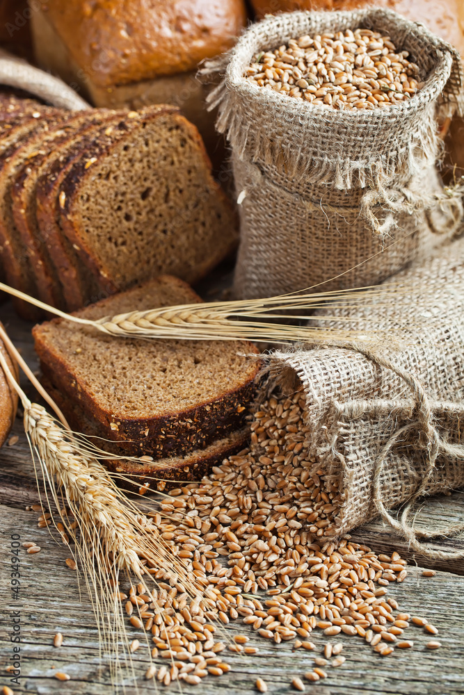 fresh bread and wheat on the wooden