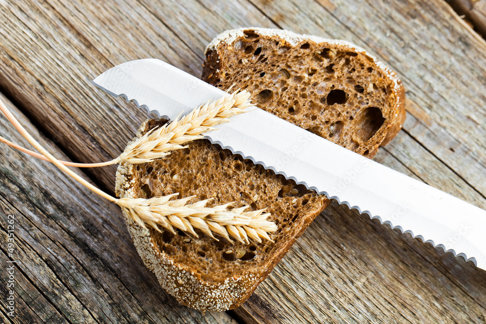 fresh bread and wheat on the wooden