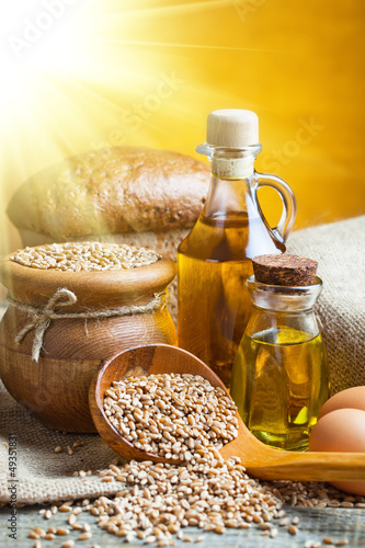 fresh bread and wheat on the wooden