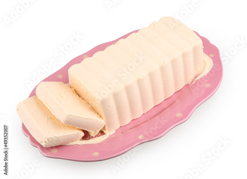 sweet frozen parfait on pink plate isolated on white