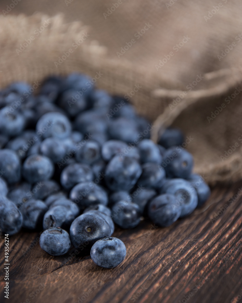 Blueberries on an old wooden table Blueberries on an old wooden table