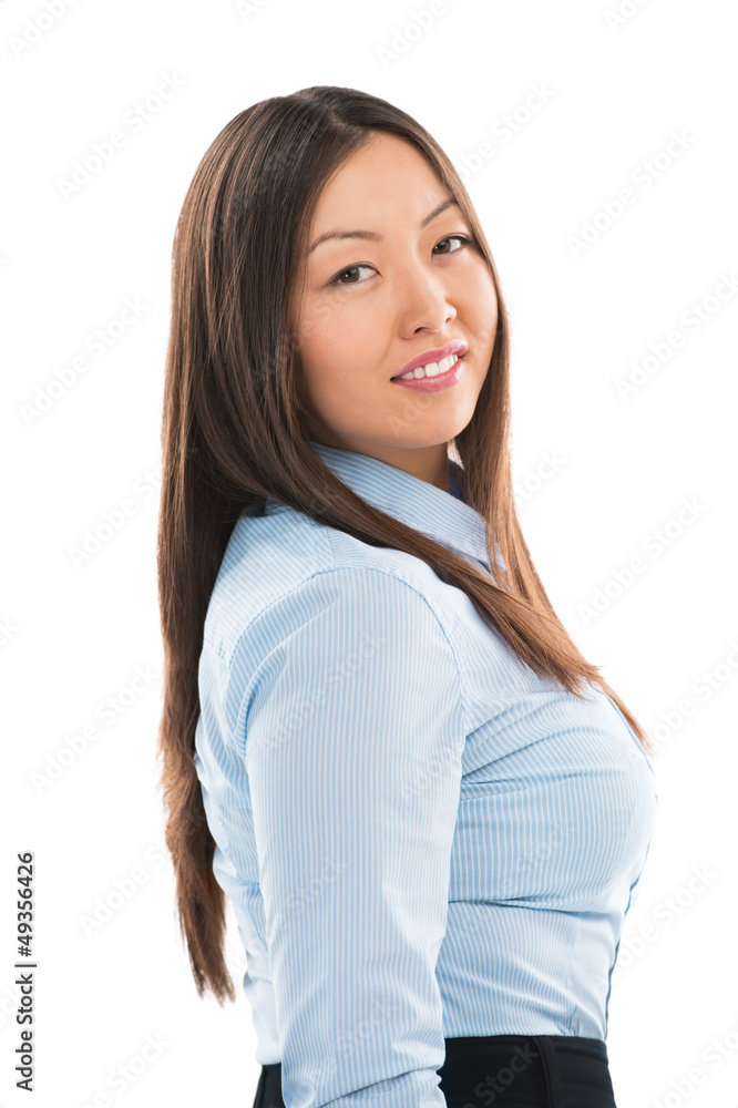 Portrait of a pretty young businesswoman standing on a white bac Portrait of a pretty young businesswoman standing on a white bac
