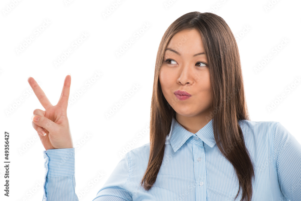 Portrait of confident young business woman showing victory gestu Portrait of confident young business woman showing victory gestu