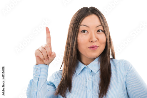 Wallpaper Mural Young asian business woman pointing up and having good idea Torontodigital.ca