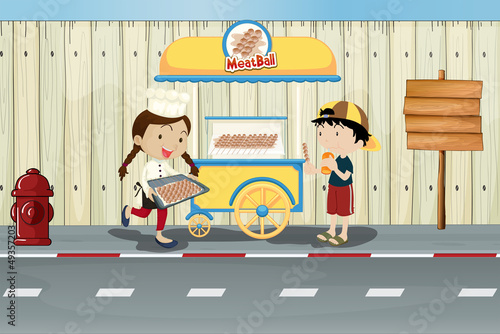 Kids and a meat ball street cart