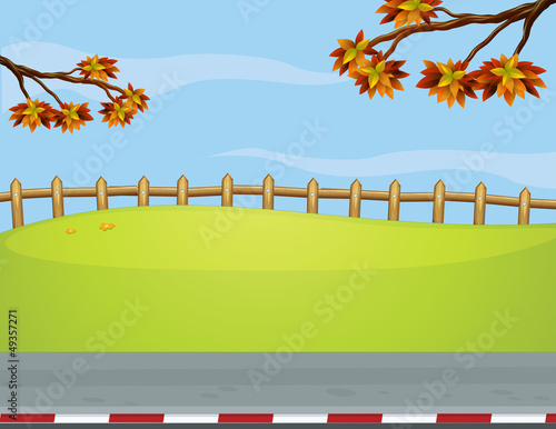 The wooden fence at the roadside