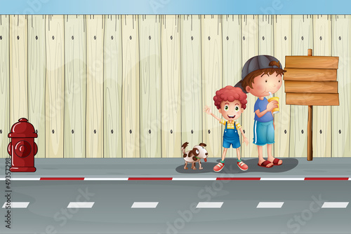 Boys with their pets in the street