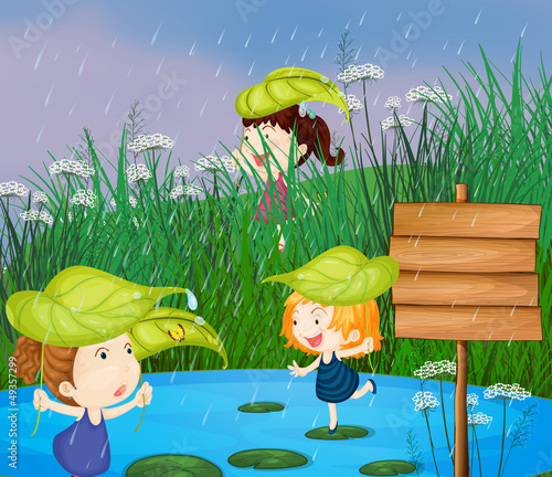 Kids playing in the rain