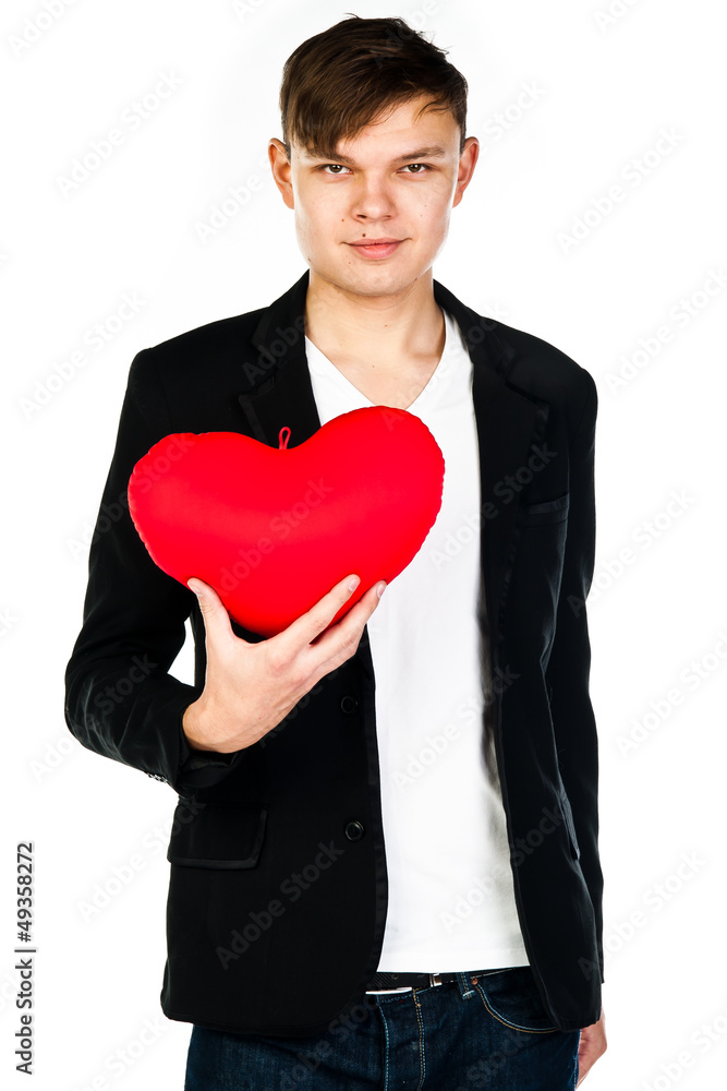 a young man with a red plush heart