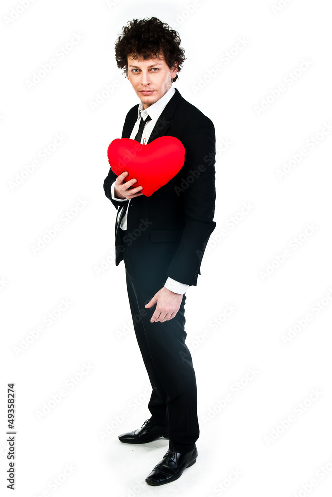 a young man with a red plush heart a young man with a red plush heart