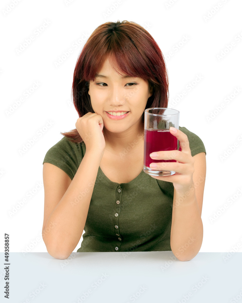 Isolated young asian woman with grapes juice over white. Isolated young asian woman with grapes juice over white.