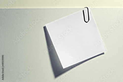 Blank memo attached to a document