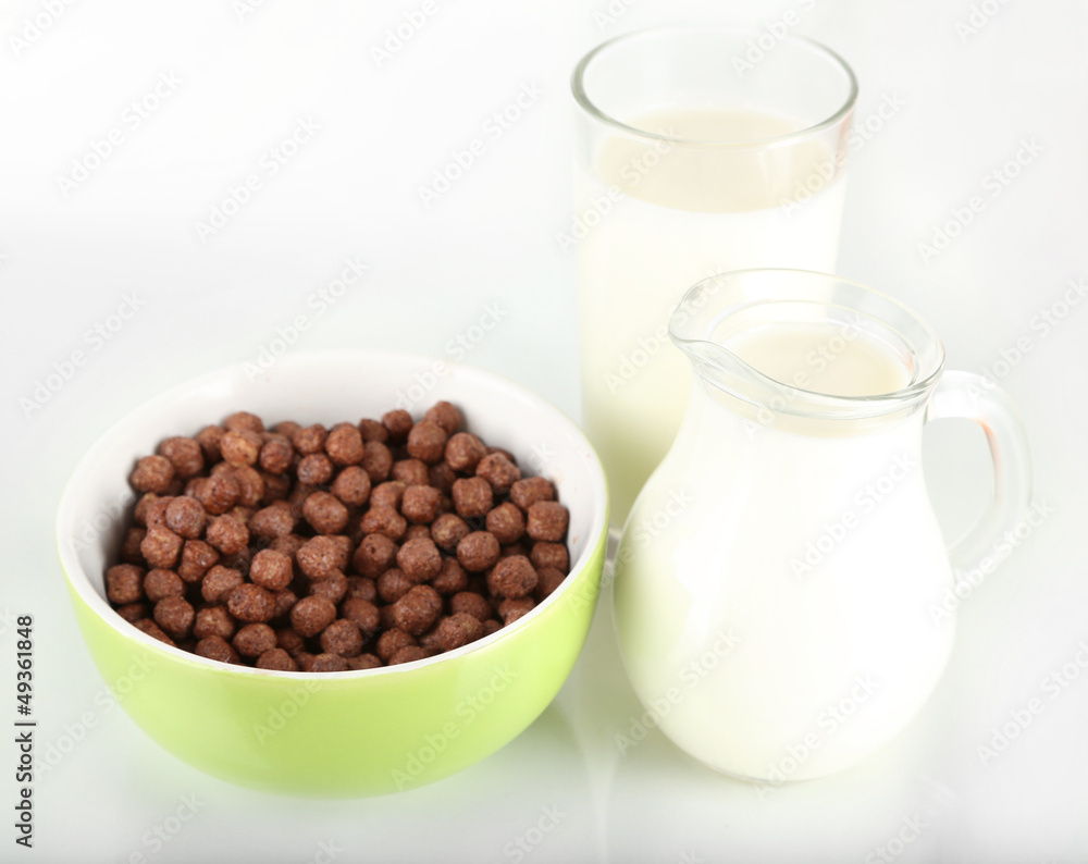 Delicious and healthy cereal in bowl with milk isolated on Delicious and healthy cereal in bowl with milk isolated on