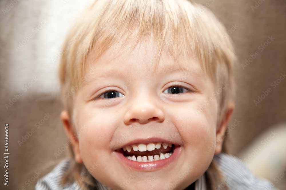 Boy smiling broadly. Boy smiling broadly.