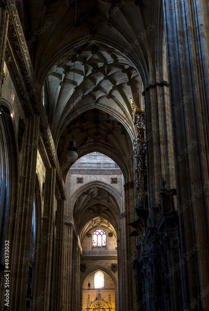 Inside Salamanca Cathedral, in a dark long corridor