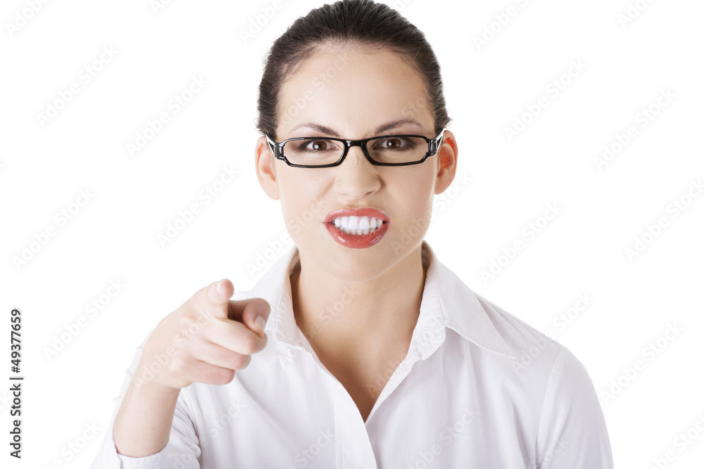 Young angry caucasian businesswoman pointing on you Young angry caucasian businesswoman pointing on you