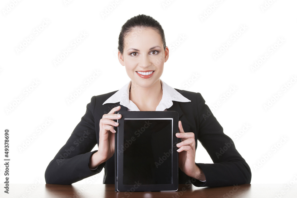 Business woman showing tablet PC with touch pad Business woman showing tablet PC with touch pad