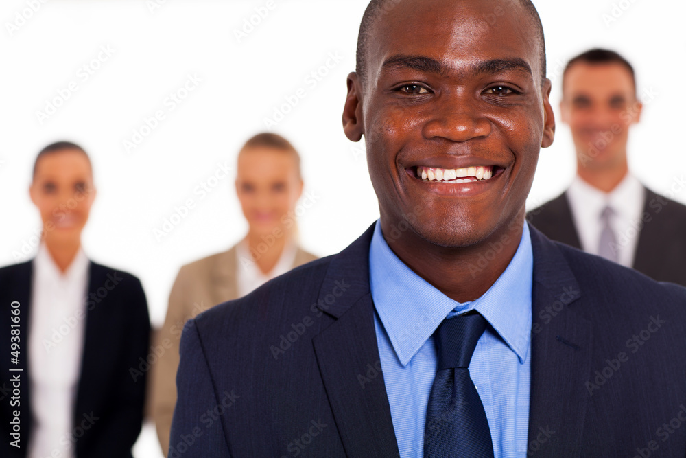 african american businessman in front of group colleagues african american businessman in front of group colleagues