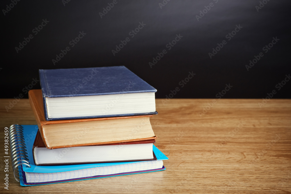 books on wooden deck table and grunge background books on wooden deck table and grunge background