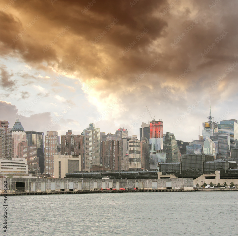 Manhattan. Beautiful sky colors over New York City skyscrapers,