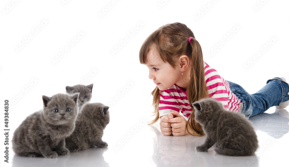 Little happy girl with a cats. isolated on white Little happy girl with a cats. isolated on white