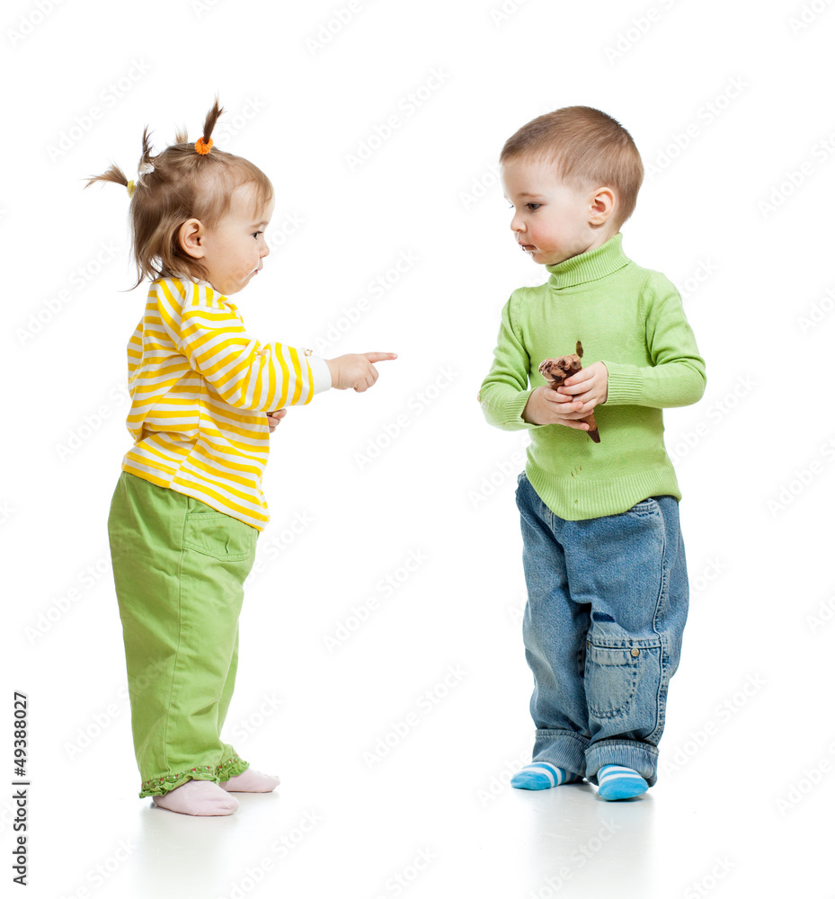 children boy and girl eating ice cream in studio isolated children boy and girl eating ice cream in studio isolated