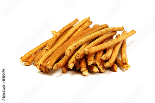 Crispy bread straw isolated on white background.
